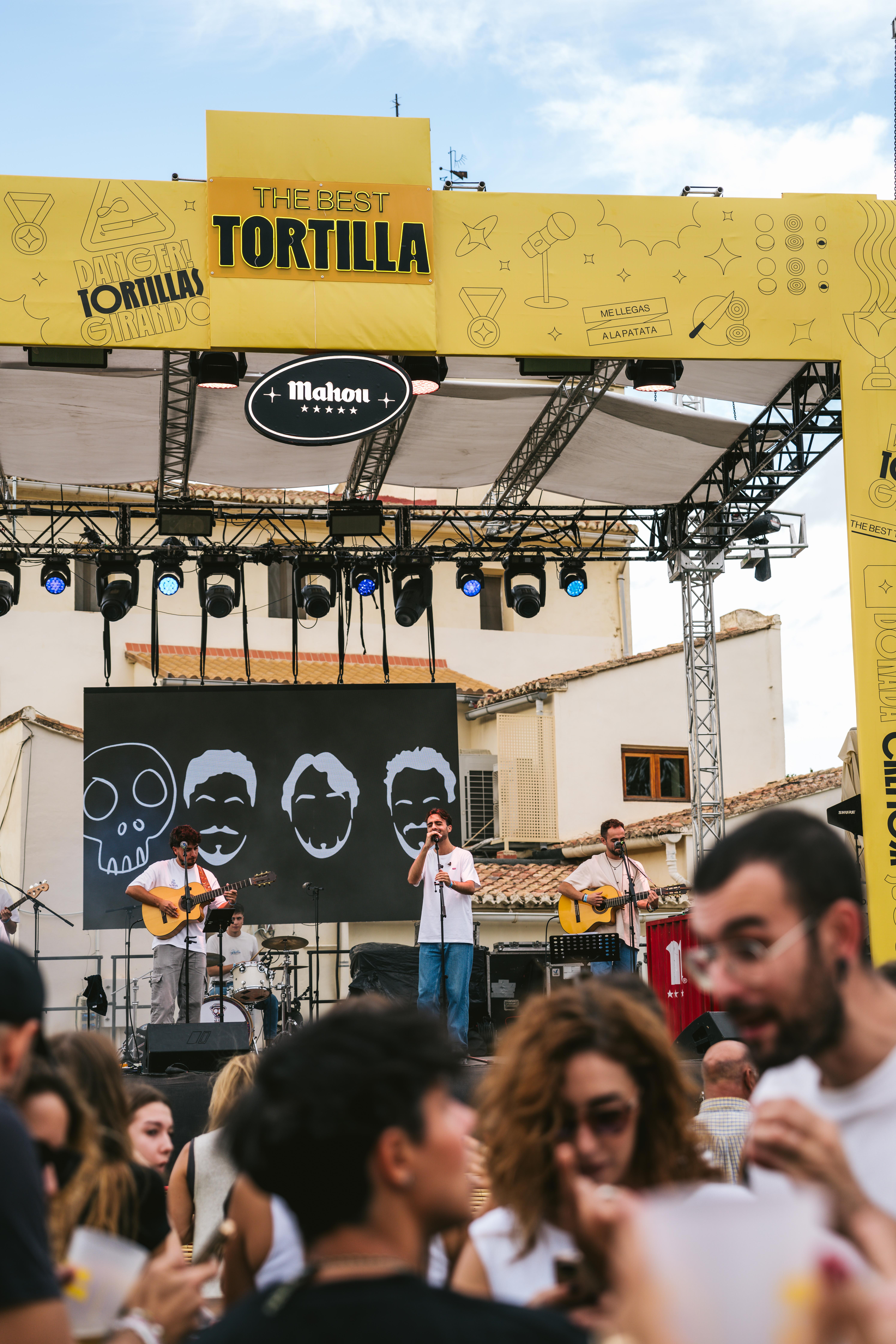 People enjoying an open-air concert